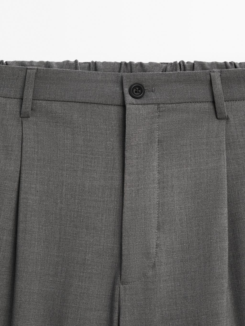 Relaxed fit trousers with darts