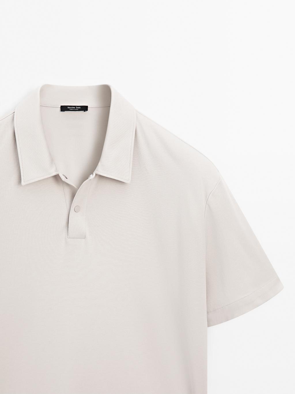 Short sleeve polo shirt with snap-button placket