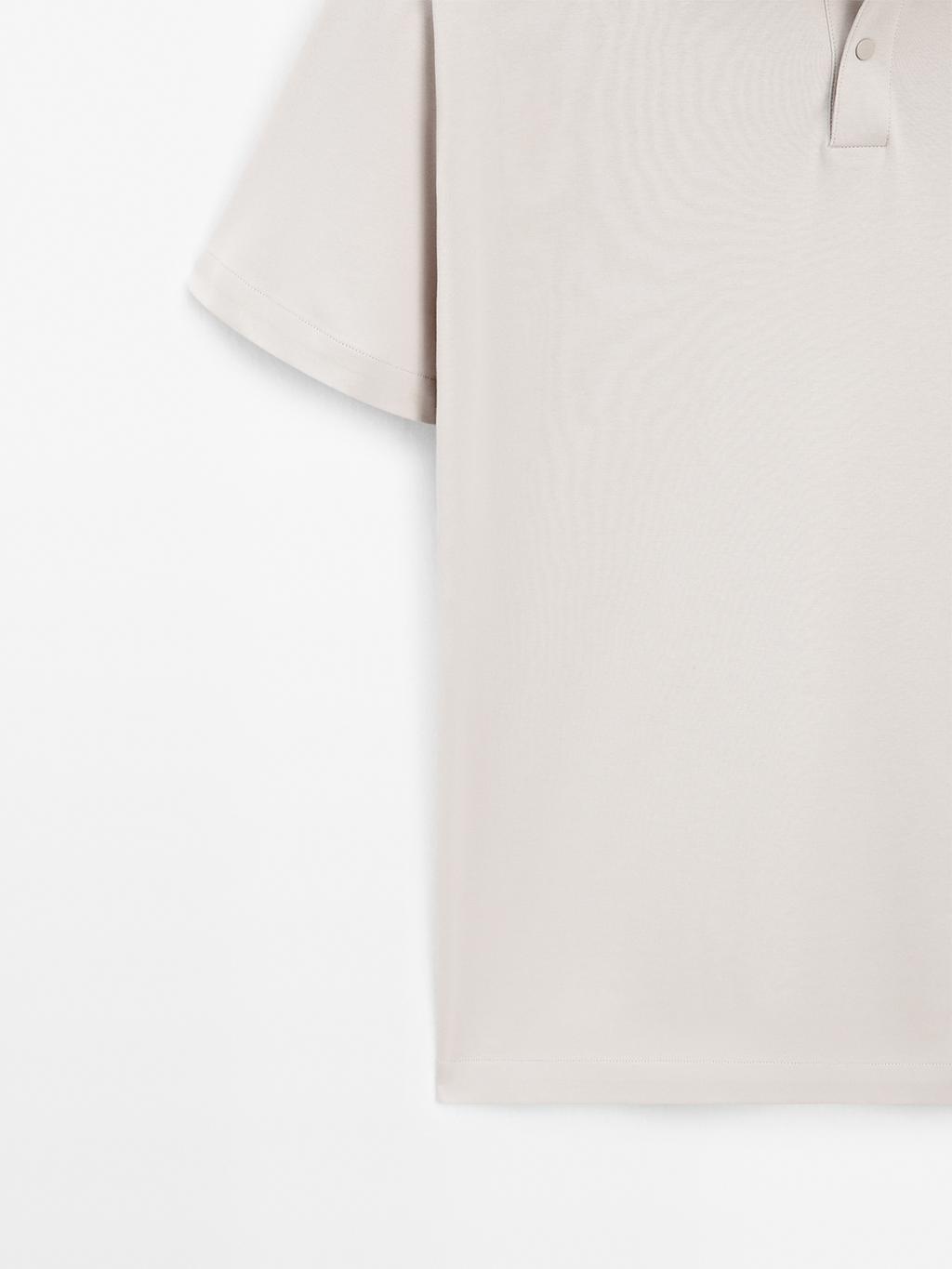 Short sleeve polo shirt with snap-button placket