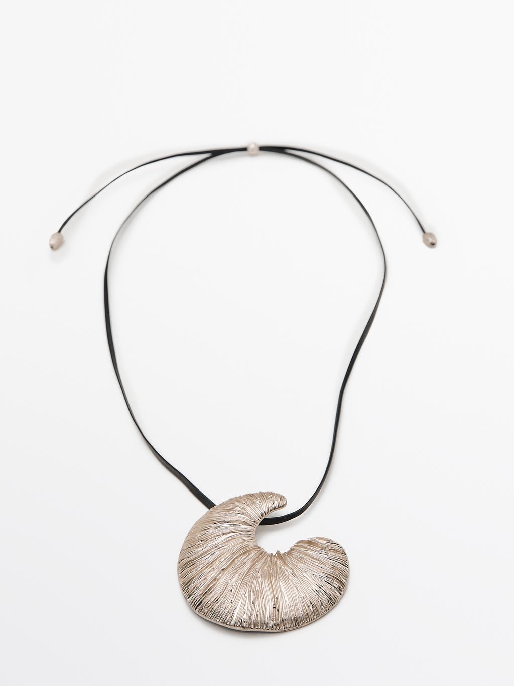 Necklace with fossil piece pendant
