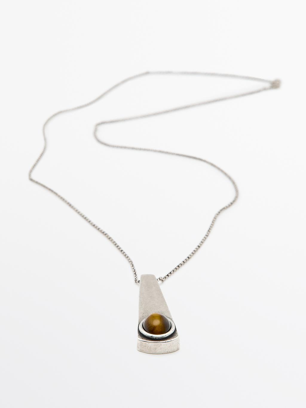 Geometric pendant with stone