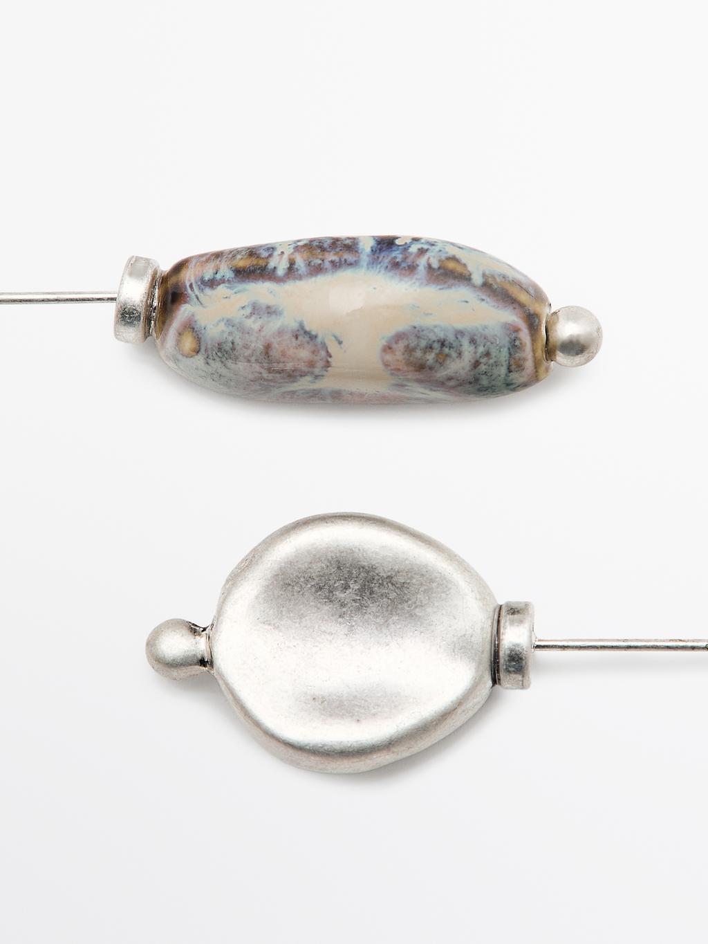 Brooch with ceramic leaf piece