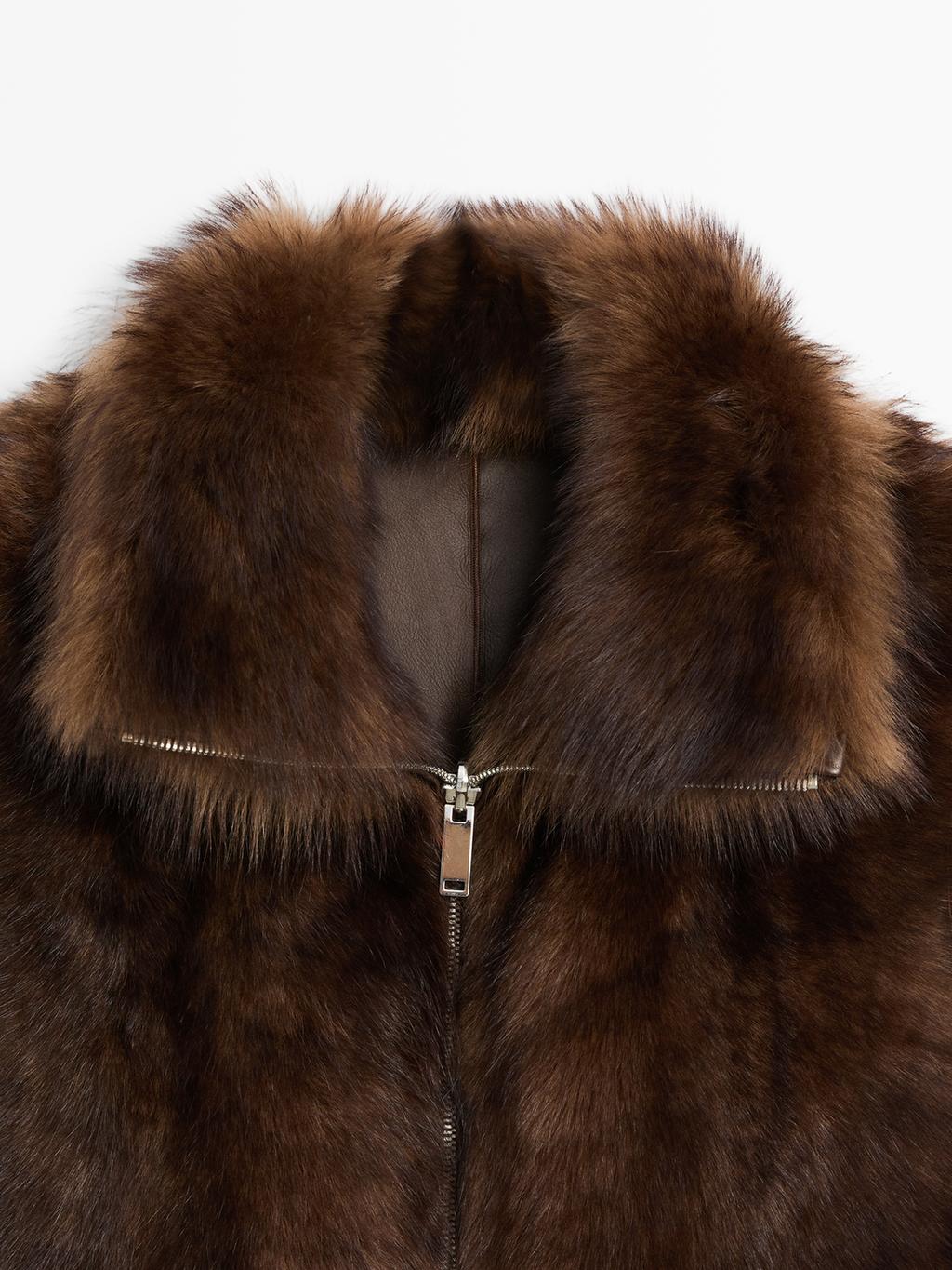 Leather high-neck waistcoat with fur