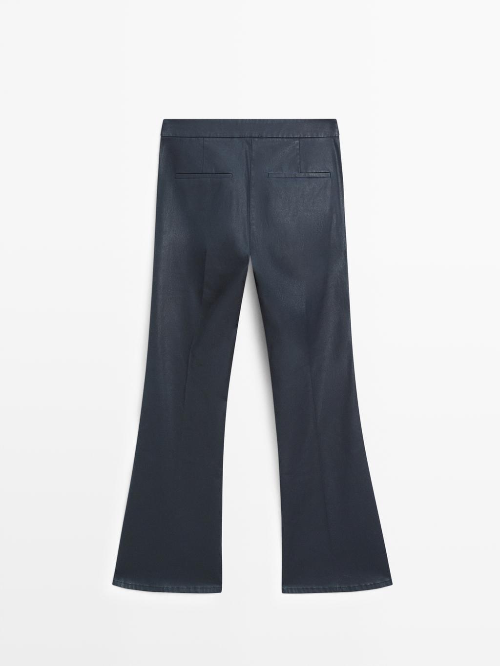 Waxed flare fit trousers