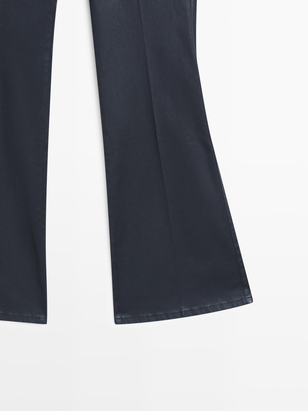 Waxed flare fit trousers