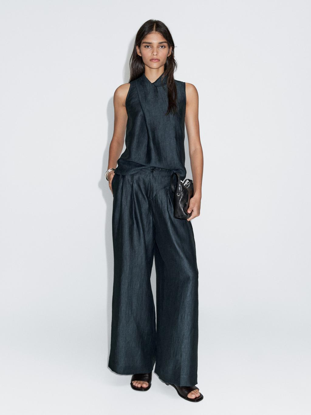 Loose-fitting linen blend trousers