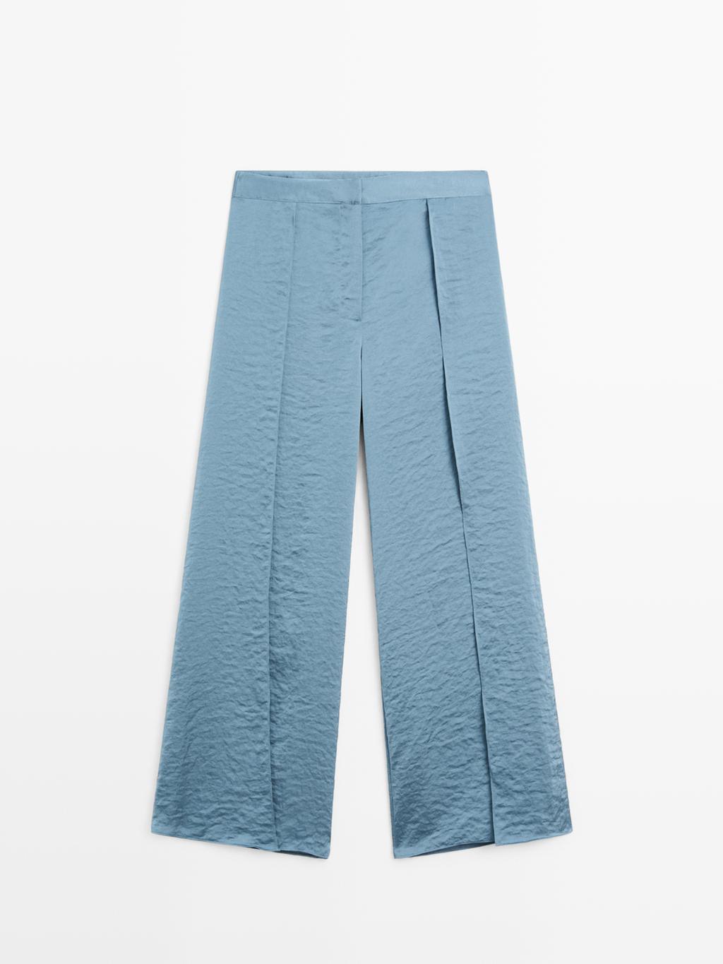 Flowing palazzo trousers with slits