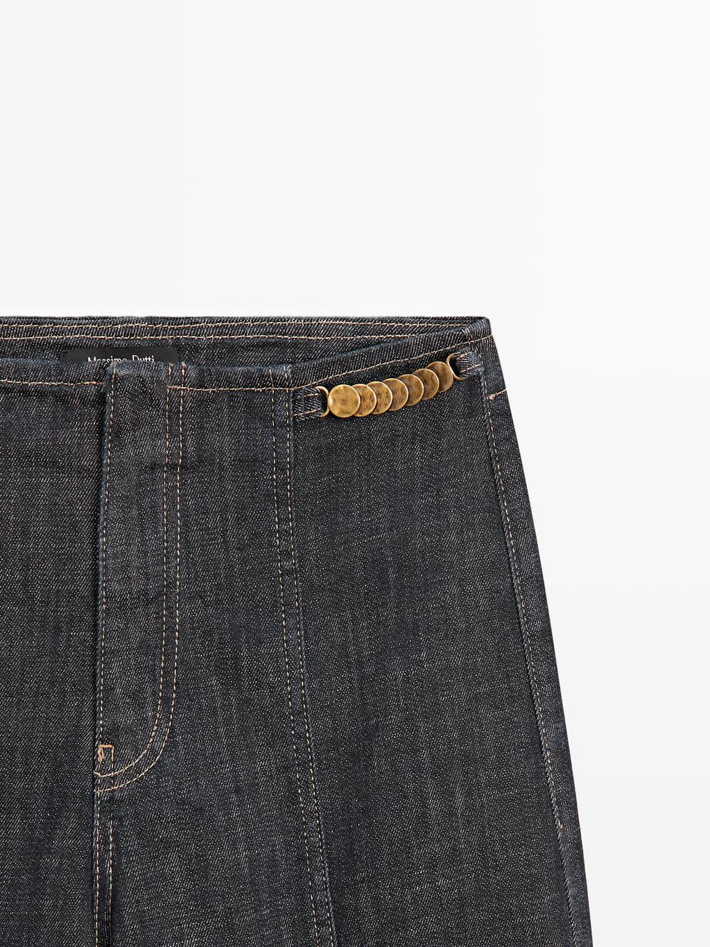 High-waist wide-leg jeans with chains