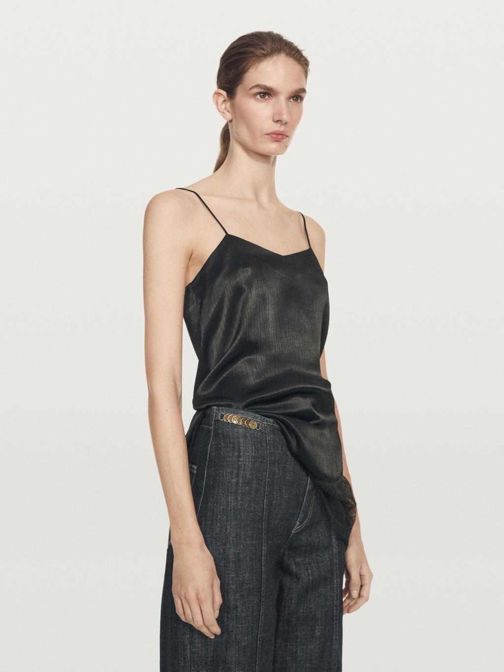 High-waist wide-leg jeans with chains