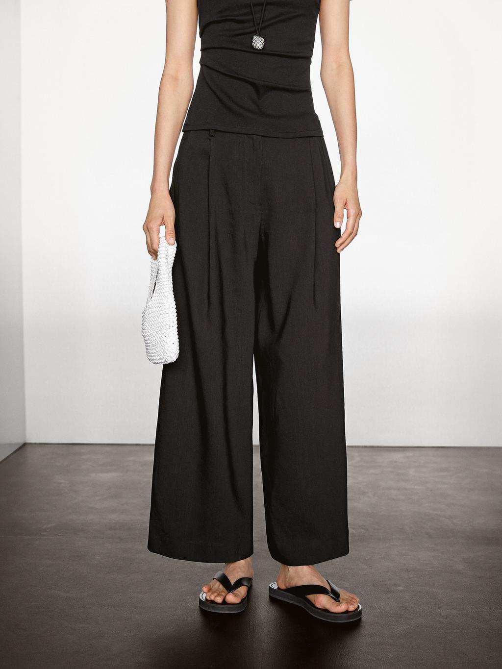Flowing linen blend trousers with darts