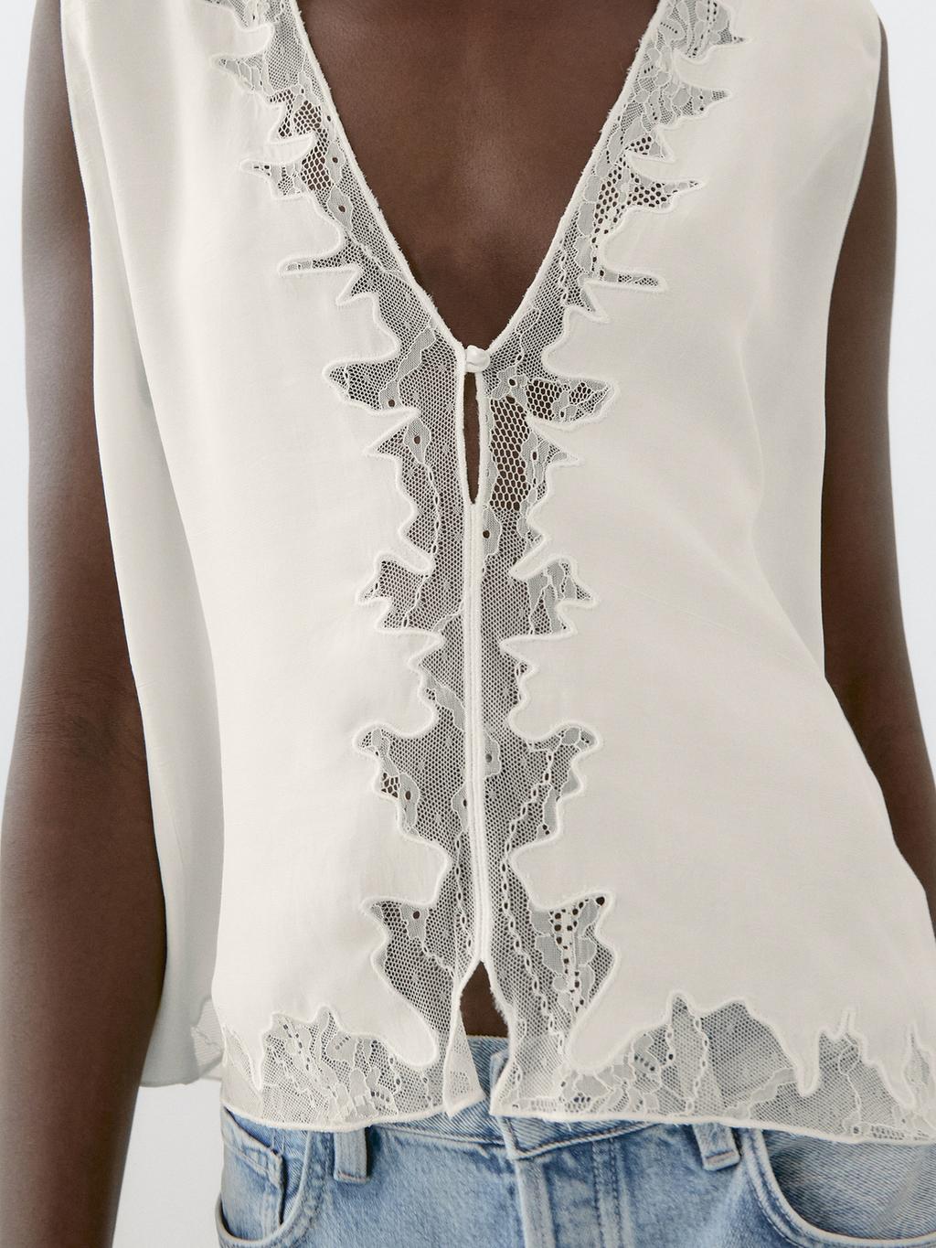 Flowing blouse with lace detail