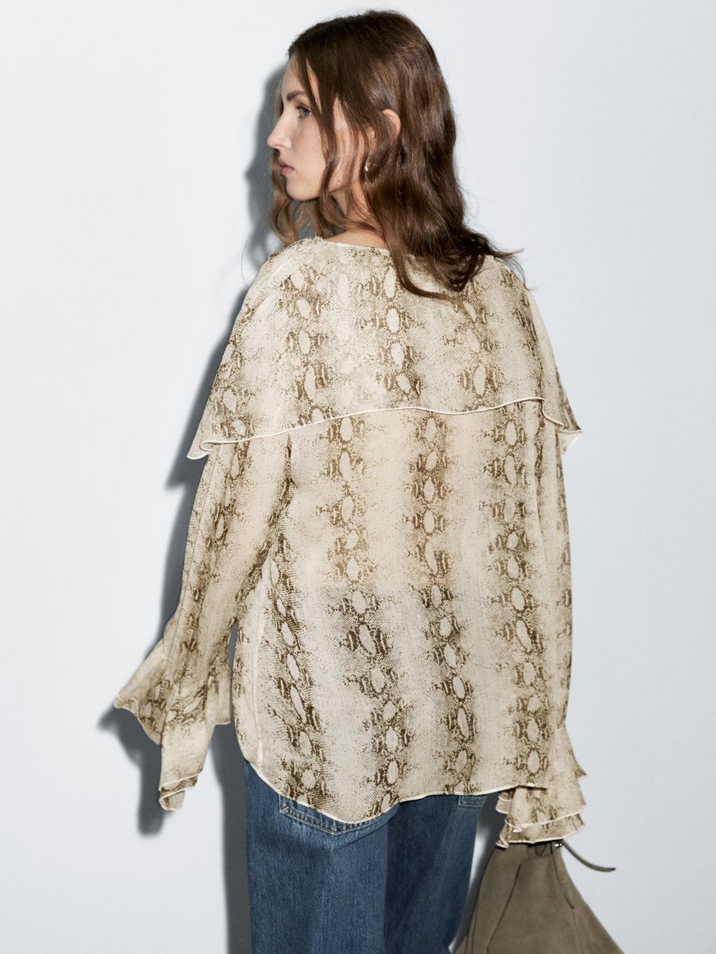 Snakeskin print blouse with ruffles