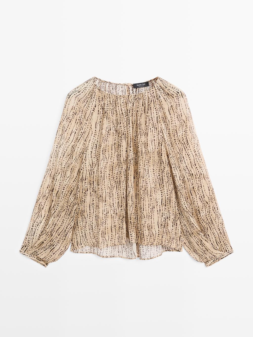 Semi-sheer draped blouse