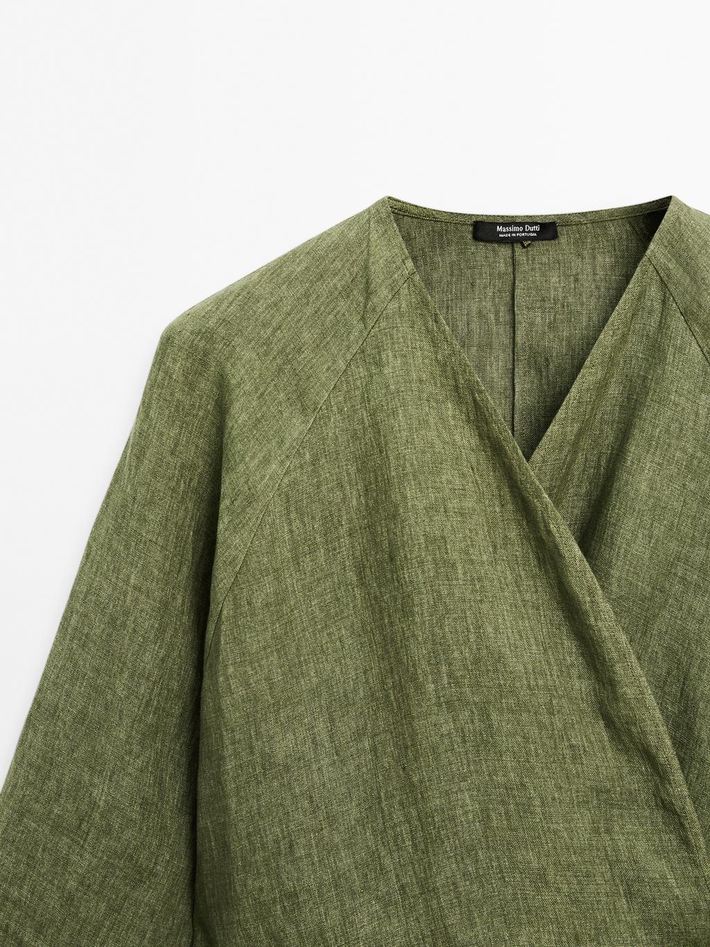 Flowing linen blouse with tie detail at the waist