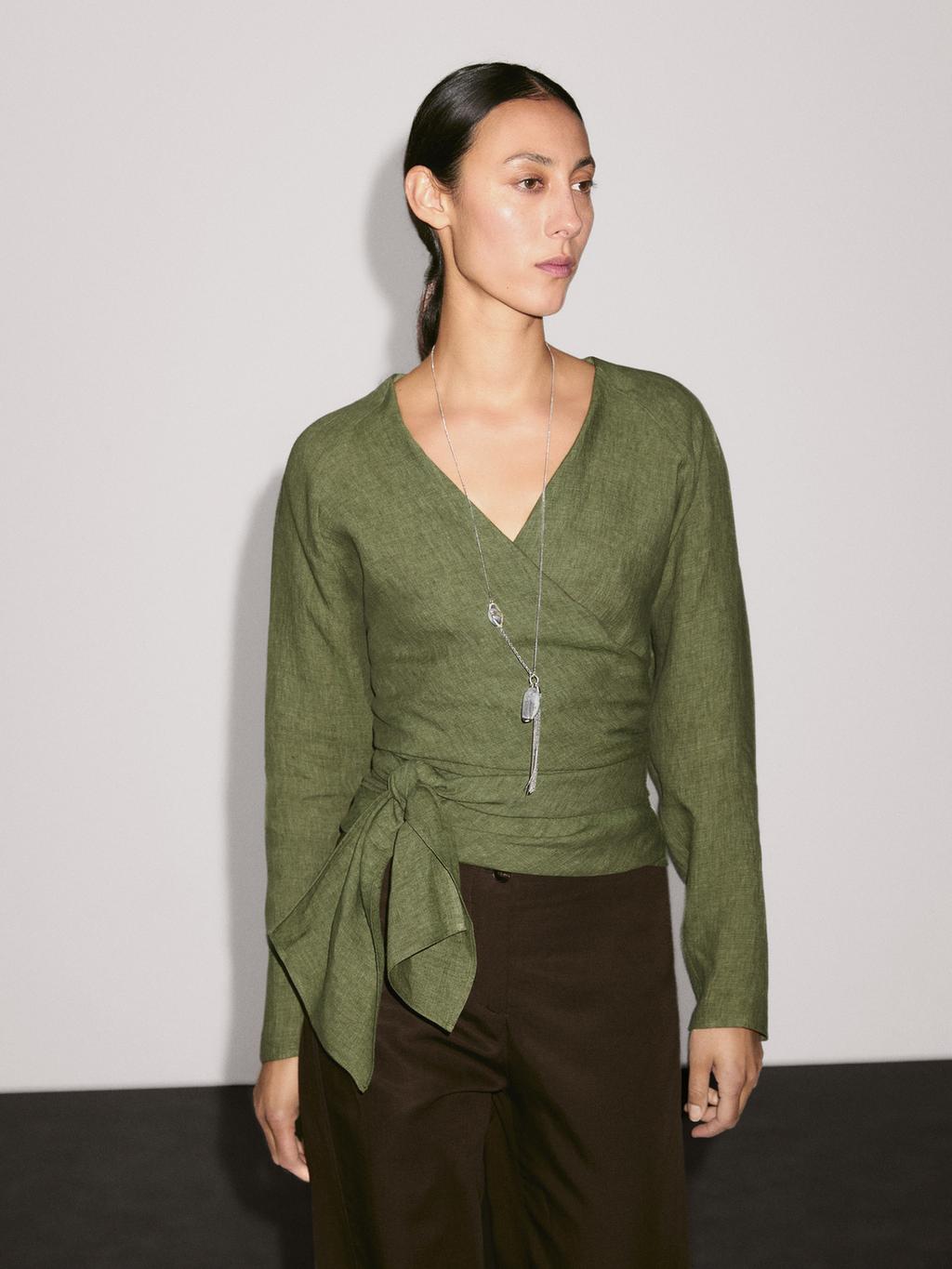 Flowing linen blouse with tie detail at the waist