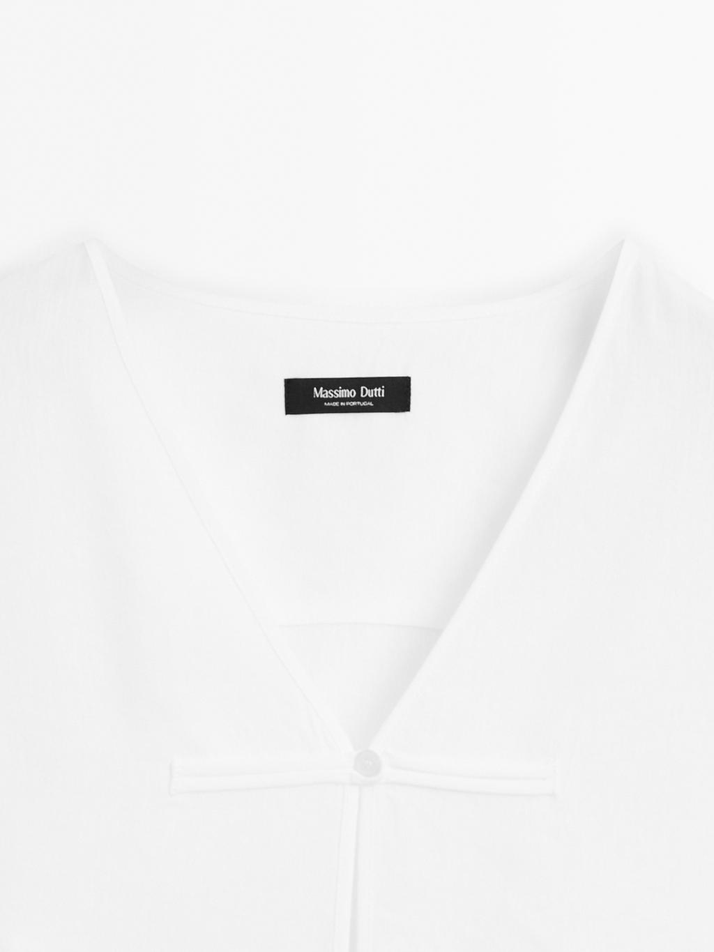 Flowing linen blend blouse with V-neckline