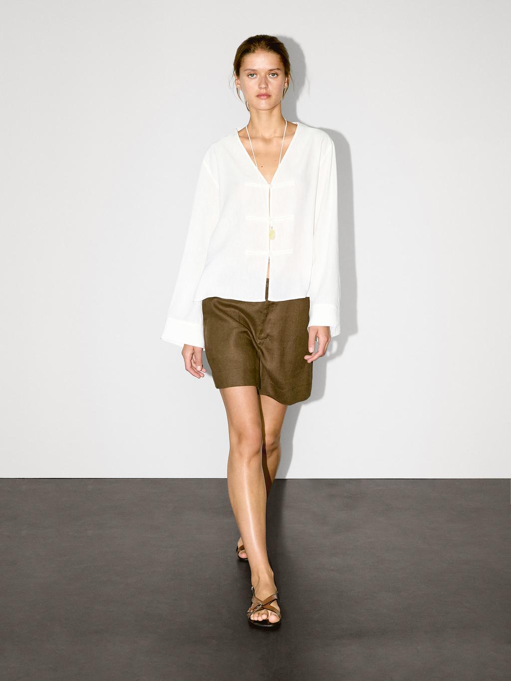 Flowing linen blend blouse with V-neckline