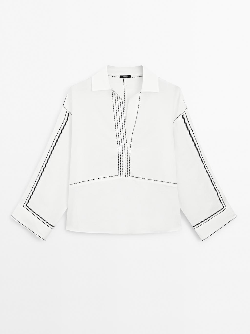 Loose-fitting blouse with contrast details