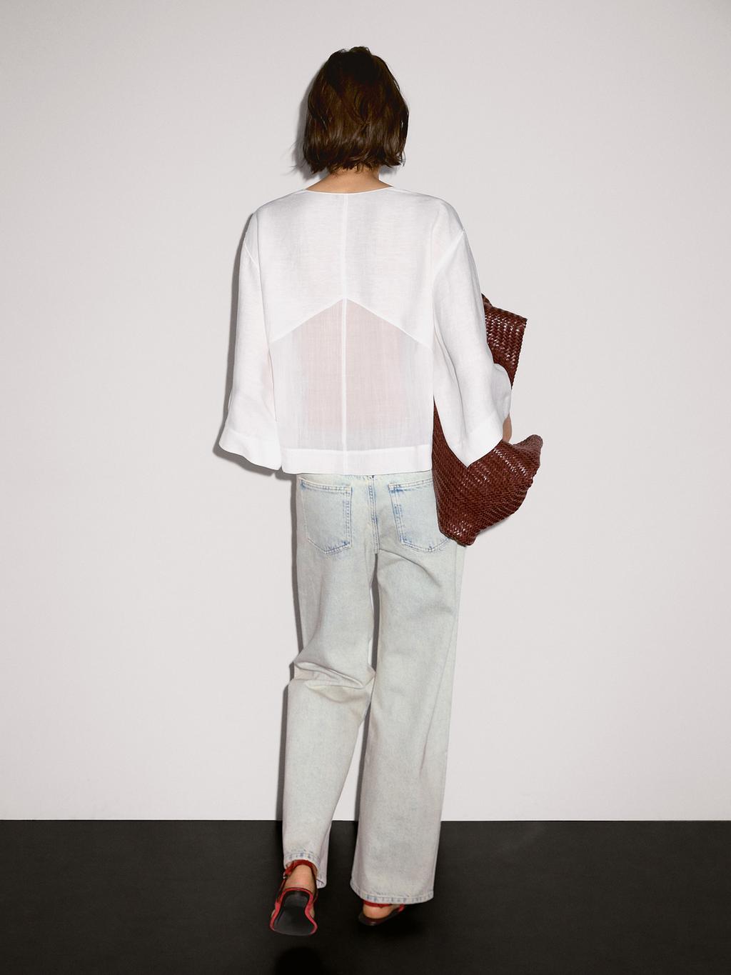 Flowing linen blend blouse with seam details