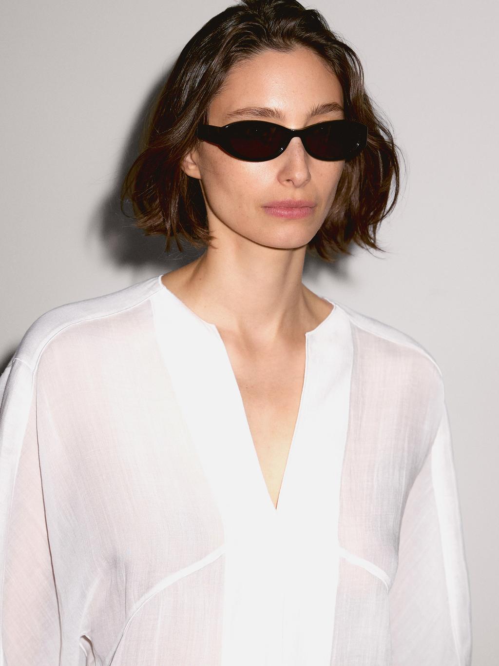 Flowing linen blend blouse with seam details