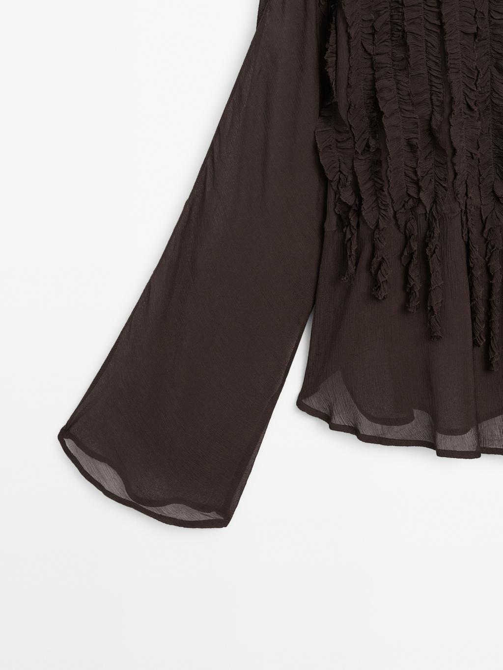 Flowing bib-front shirt with ruffles