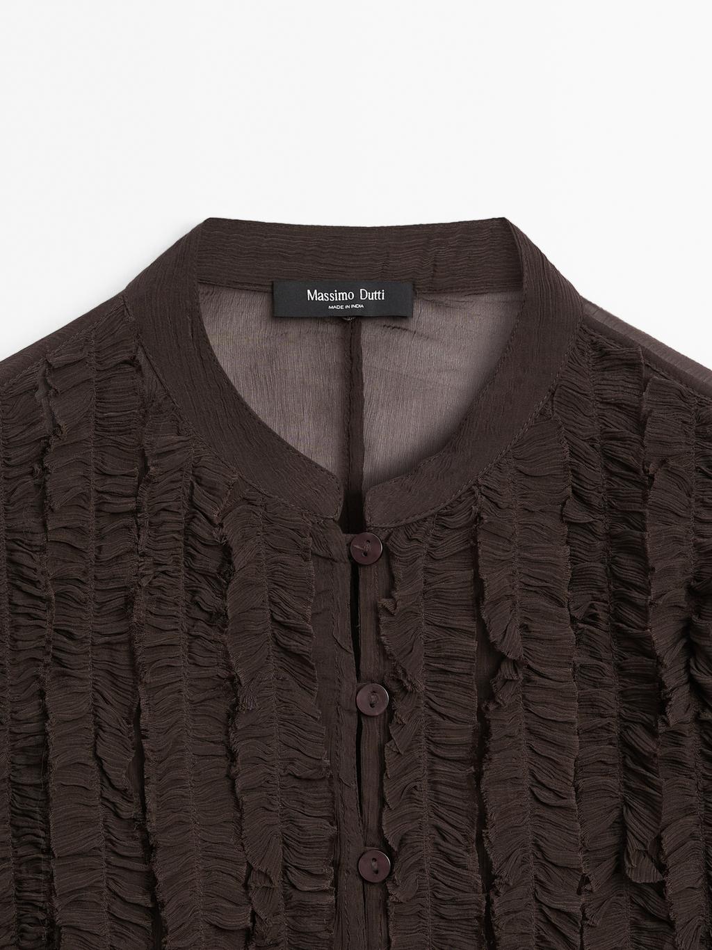 Flowing bib-front shirt with ruffles