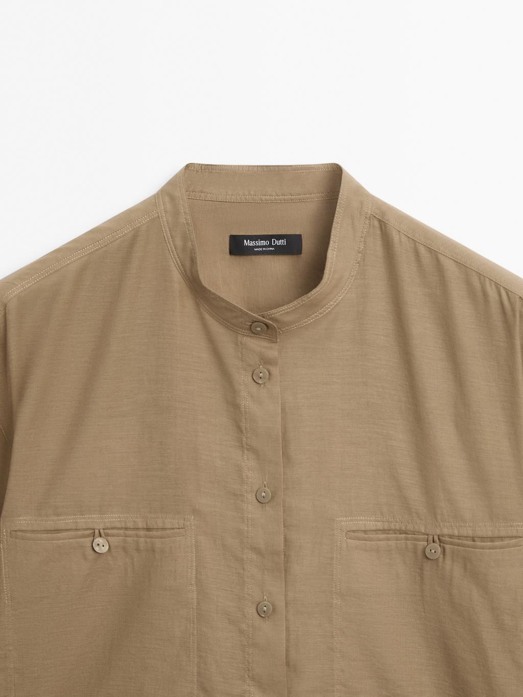 Long shirt with stand collar