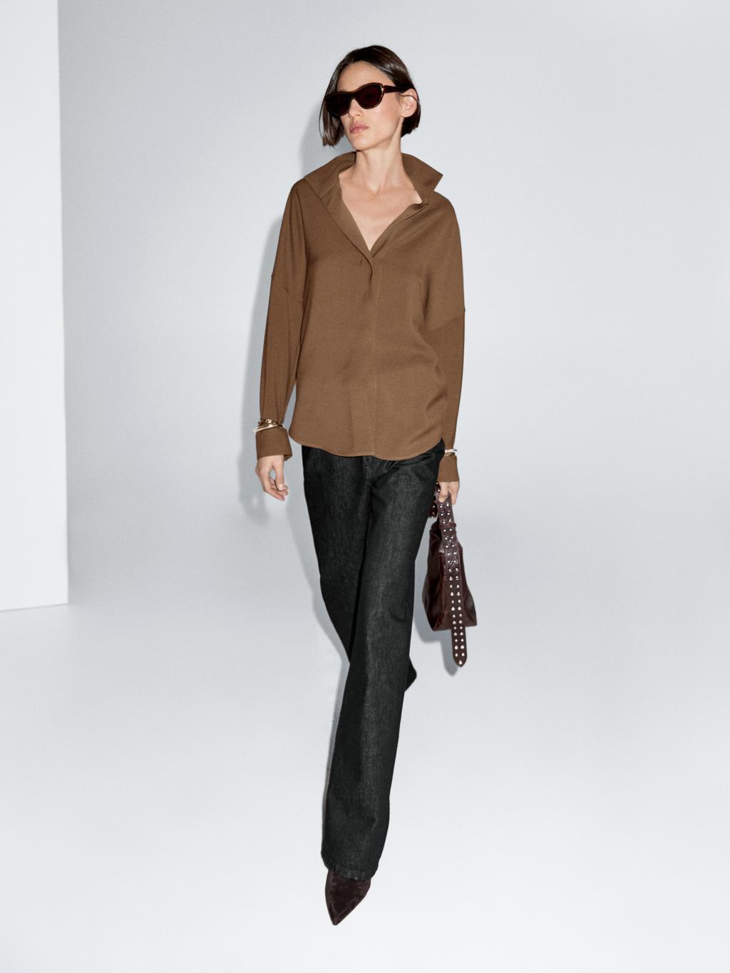 Flowing shirt with hidden buttons