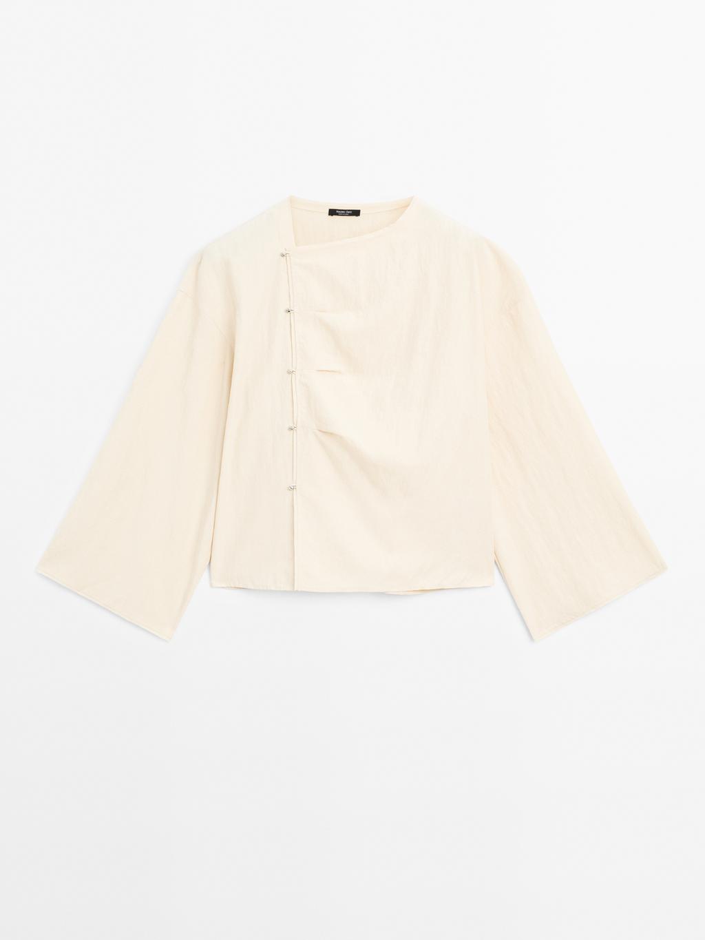 Long sleeve blouse with side button fastening