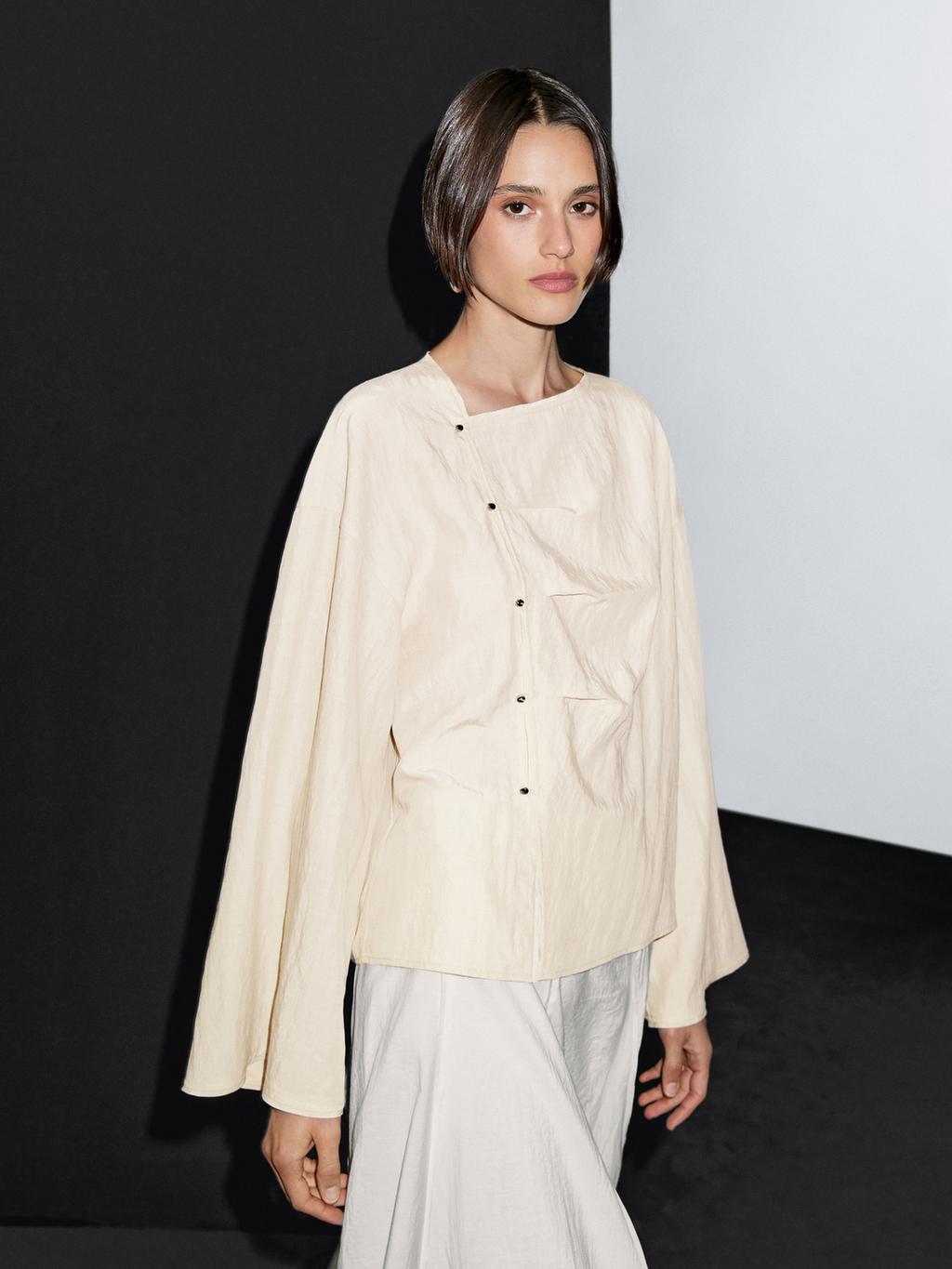 Long sleeve blouse with side button fastening