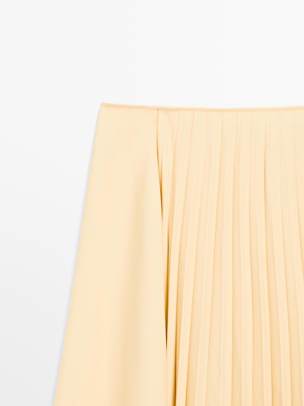 Asymmetric box pleat skirt