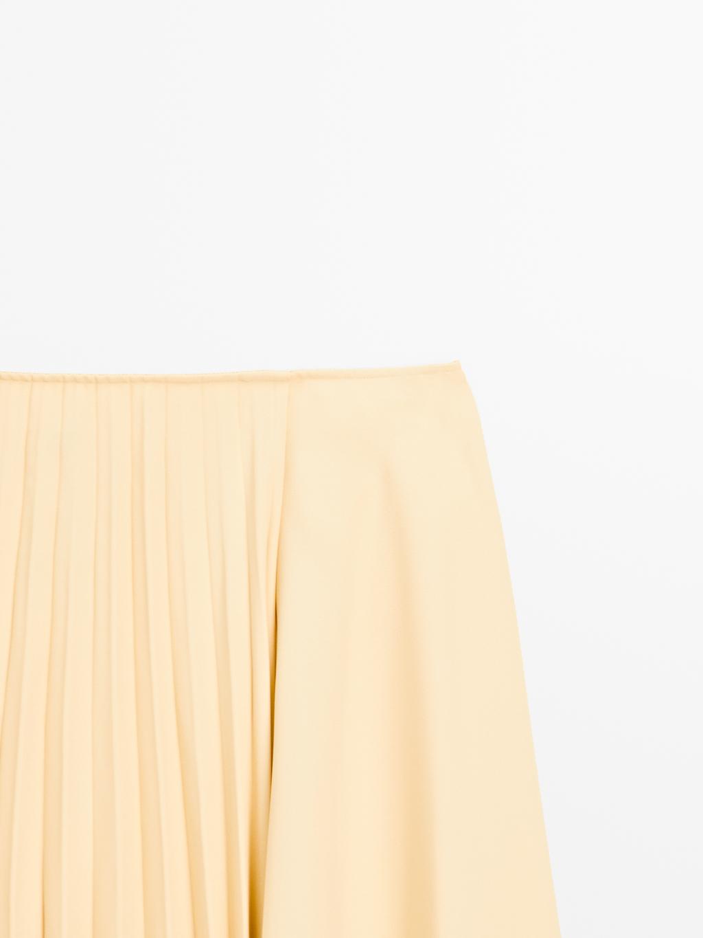 Asymmetric box pleat skirt