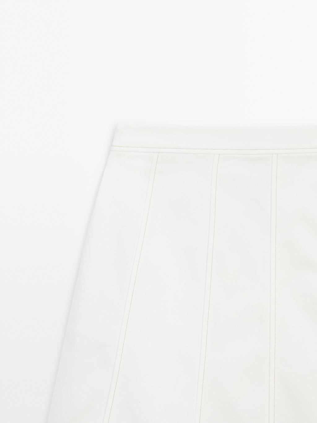 Short denim skirt with seam details