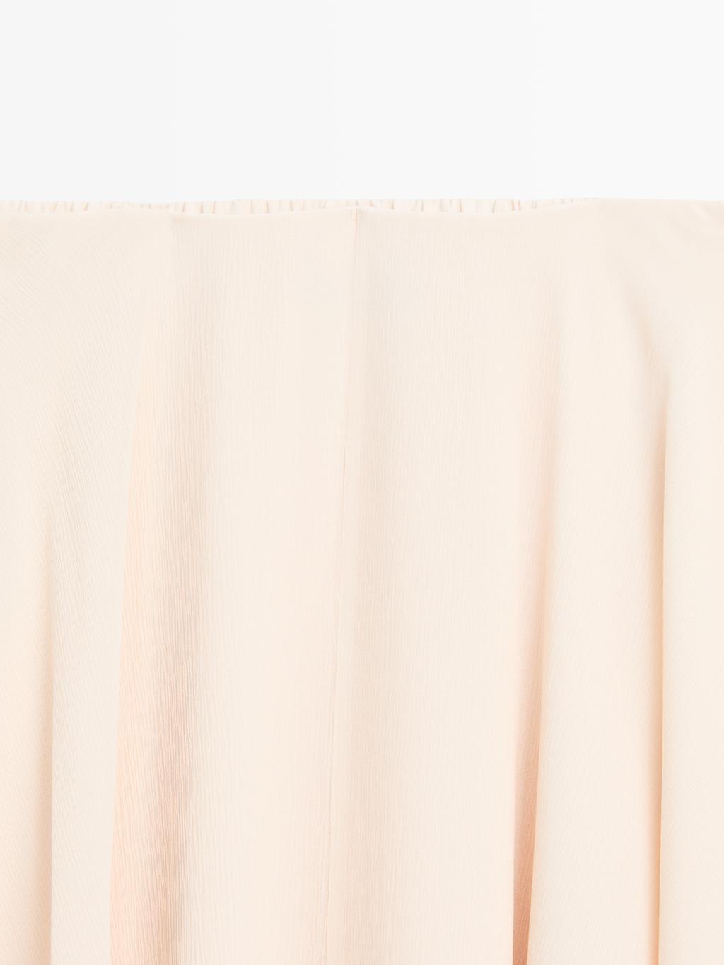 Flowing asymmetric midi skirt