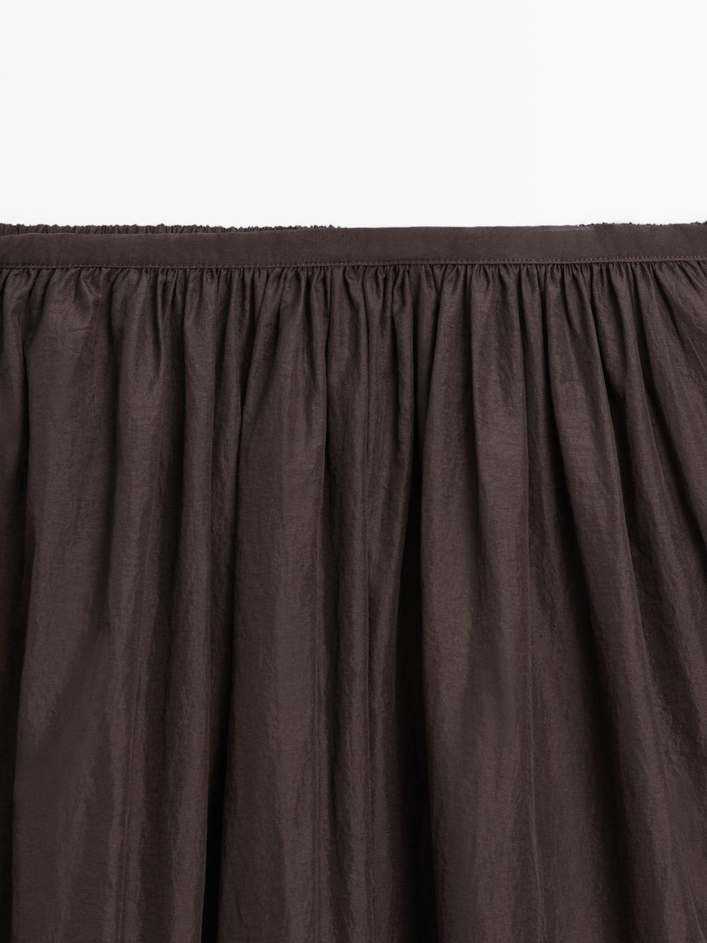 Long skirt with gathered detail