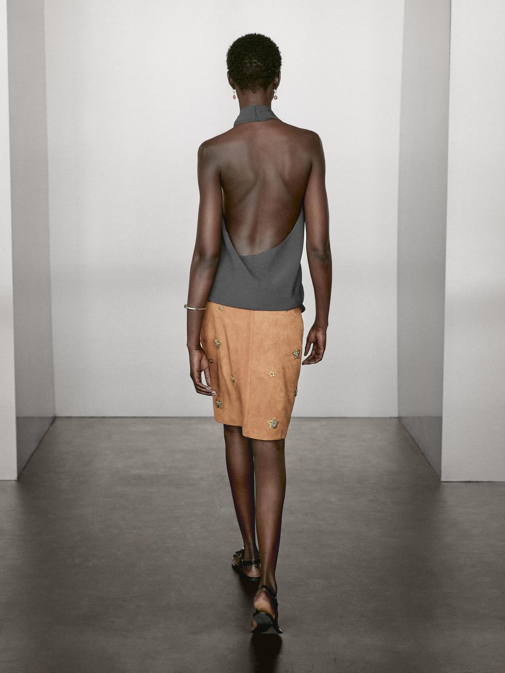 Suede leather skirt with rhinestone detail