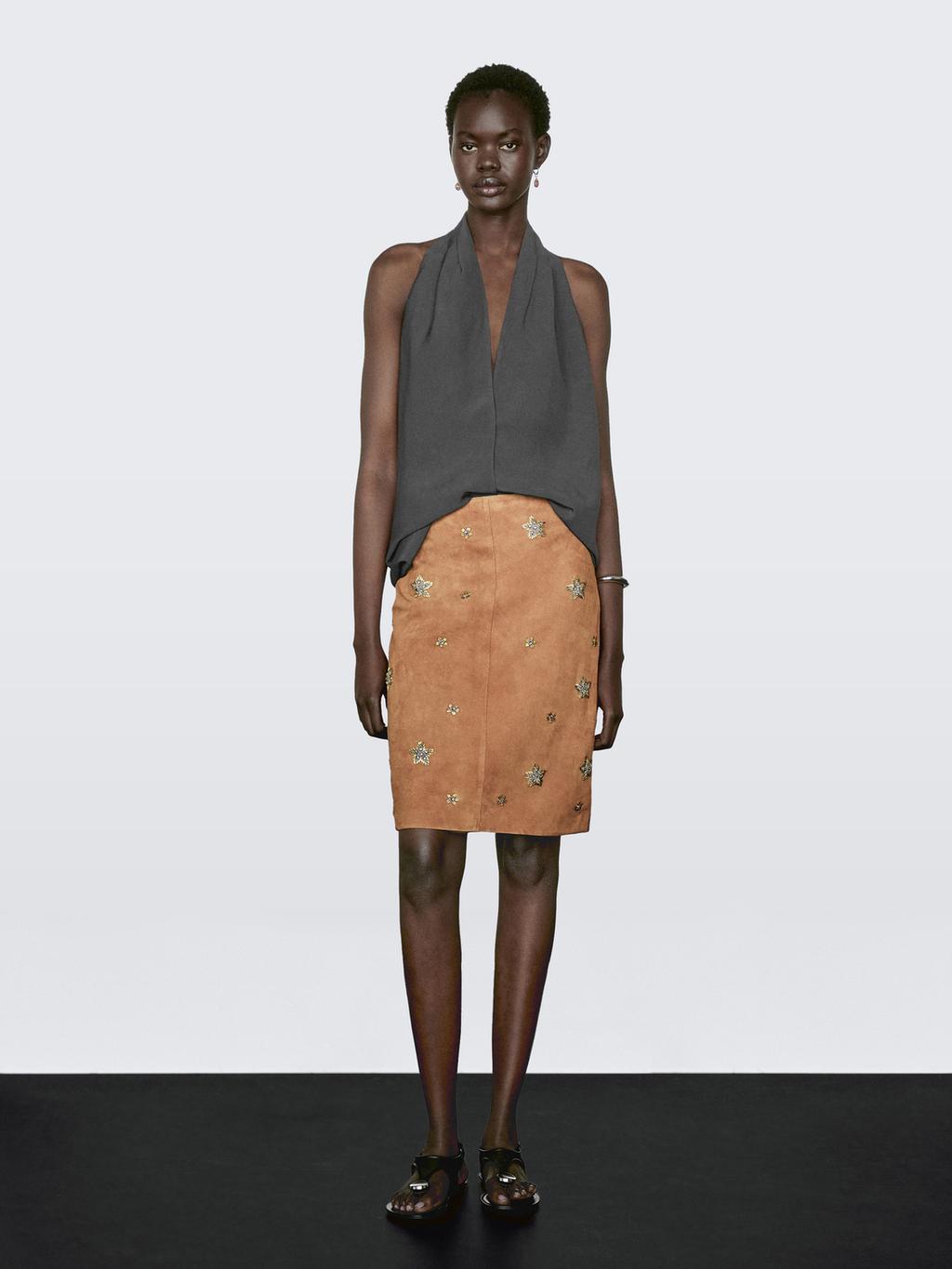 Suede leather skirt with rhinestone detail