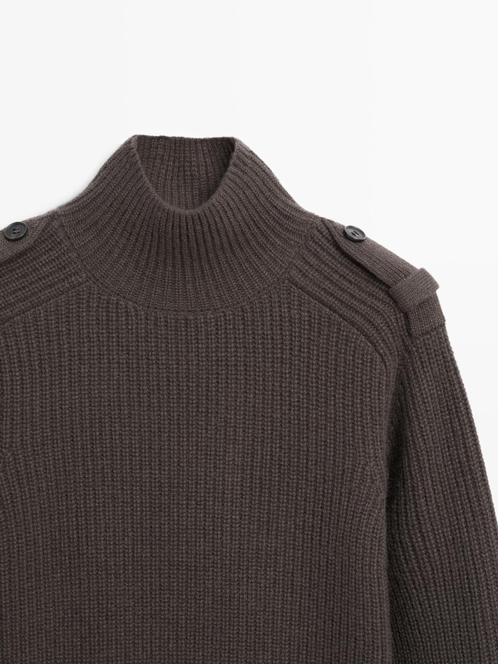 Knit sweater with shoulder detail