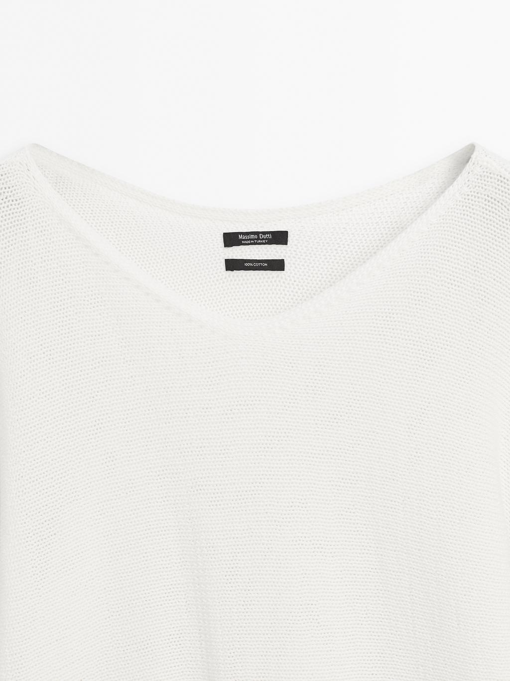 Knit sweater with bow detail