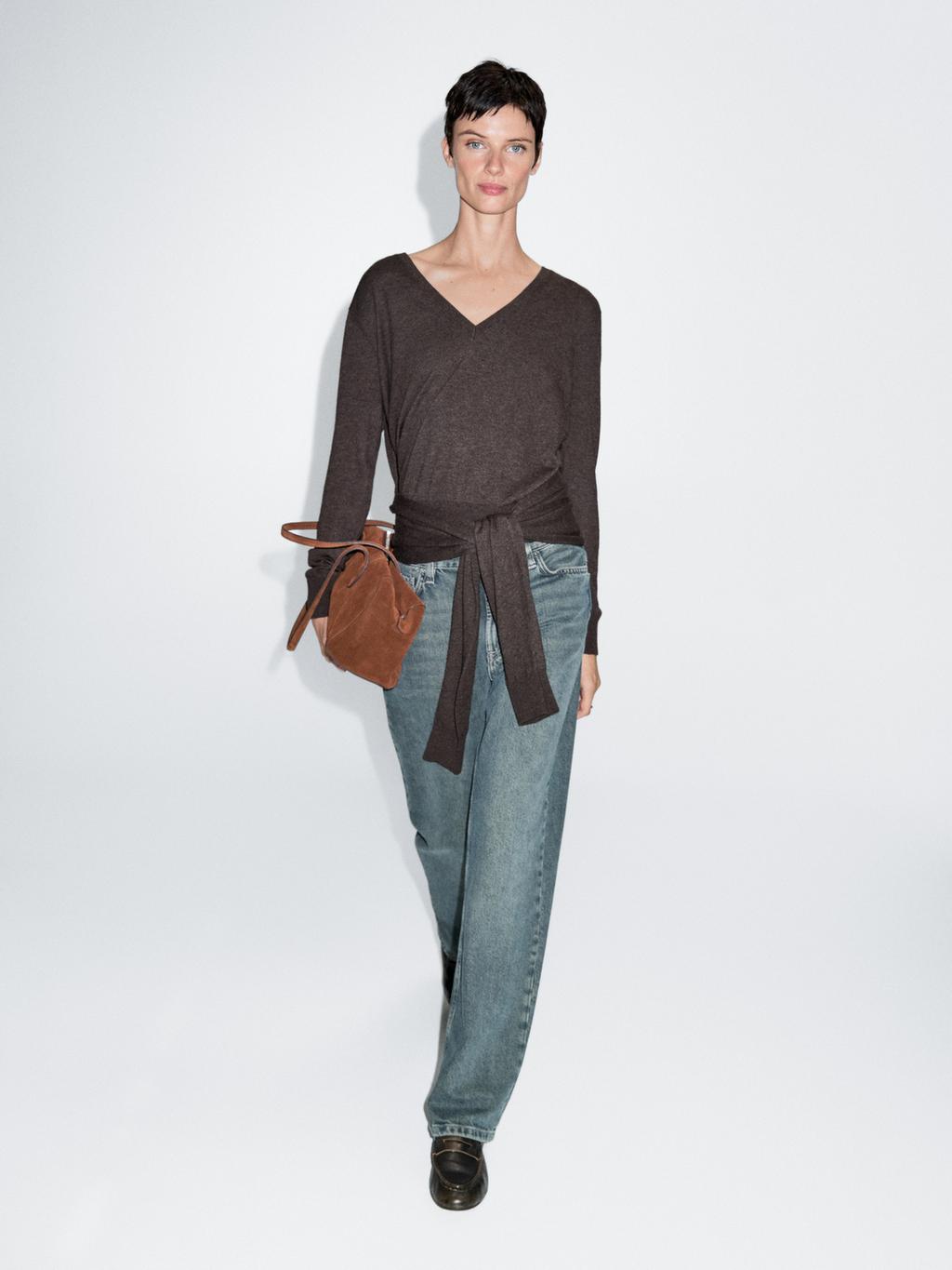 Knit sweater with multiway sleeves