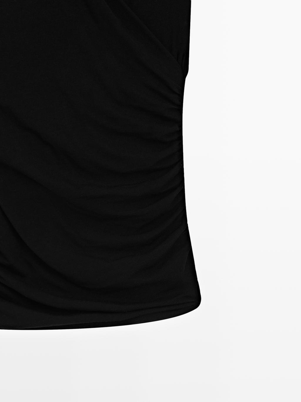 Sleeveless draped top