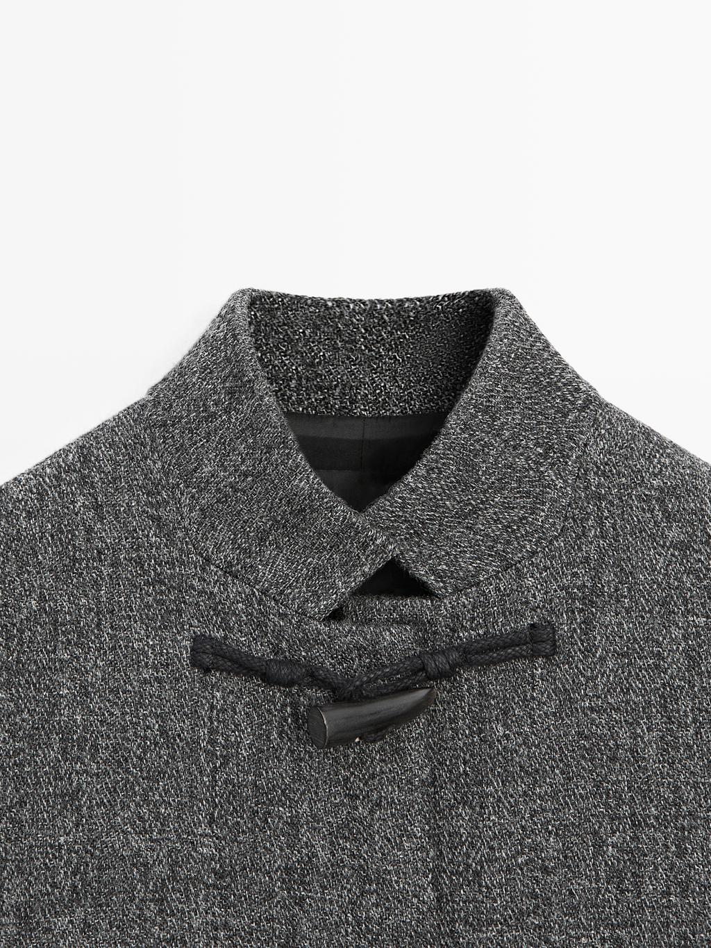Mid-length coat with horn toggle
