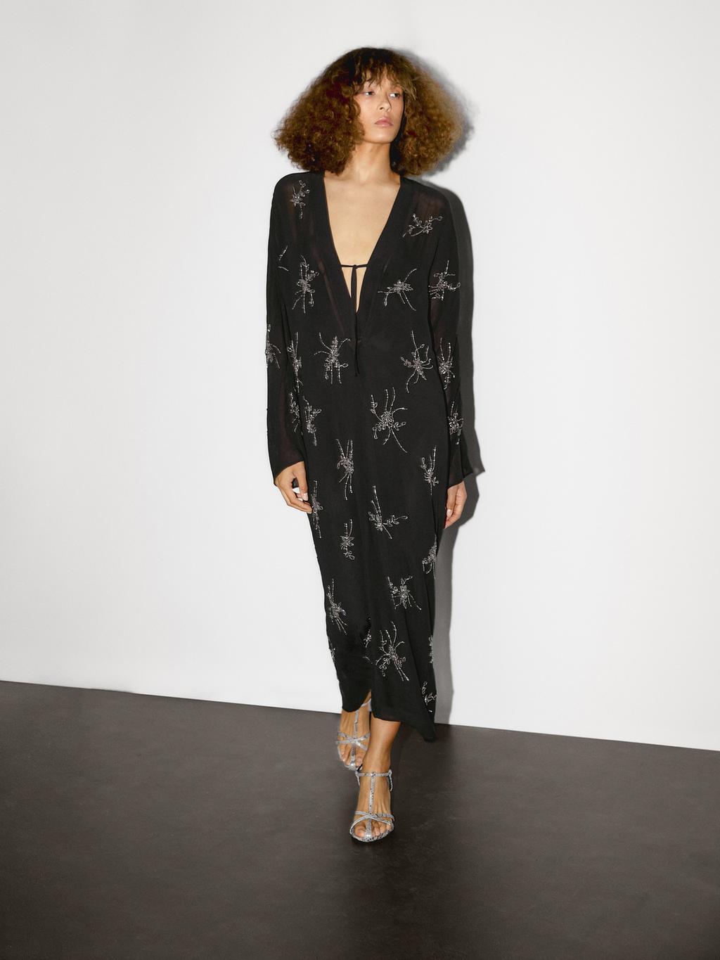 Flowing midi dress with embroidery