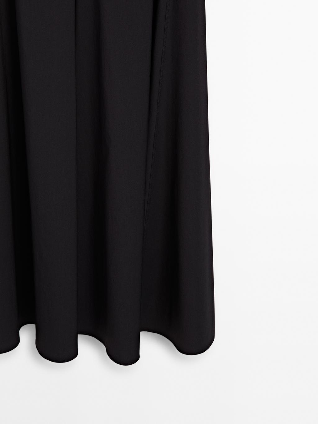 Long halter neck dress with flounce