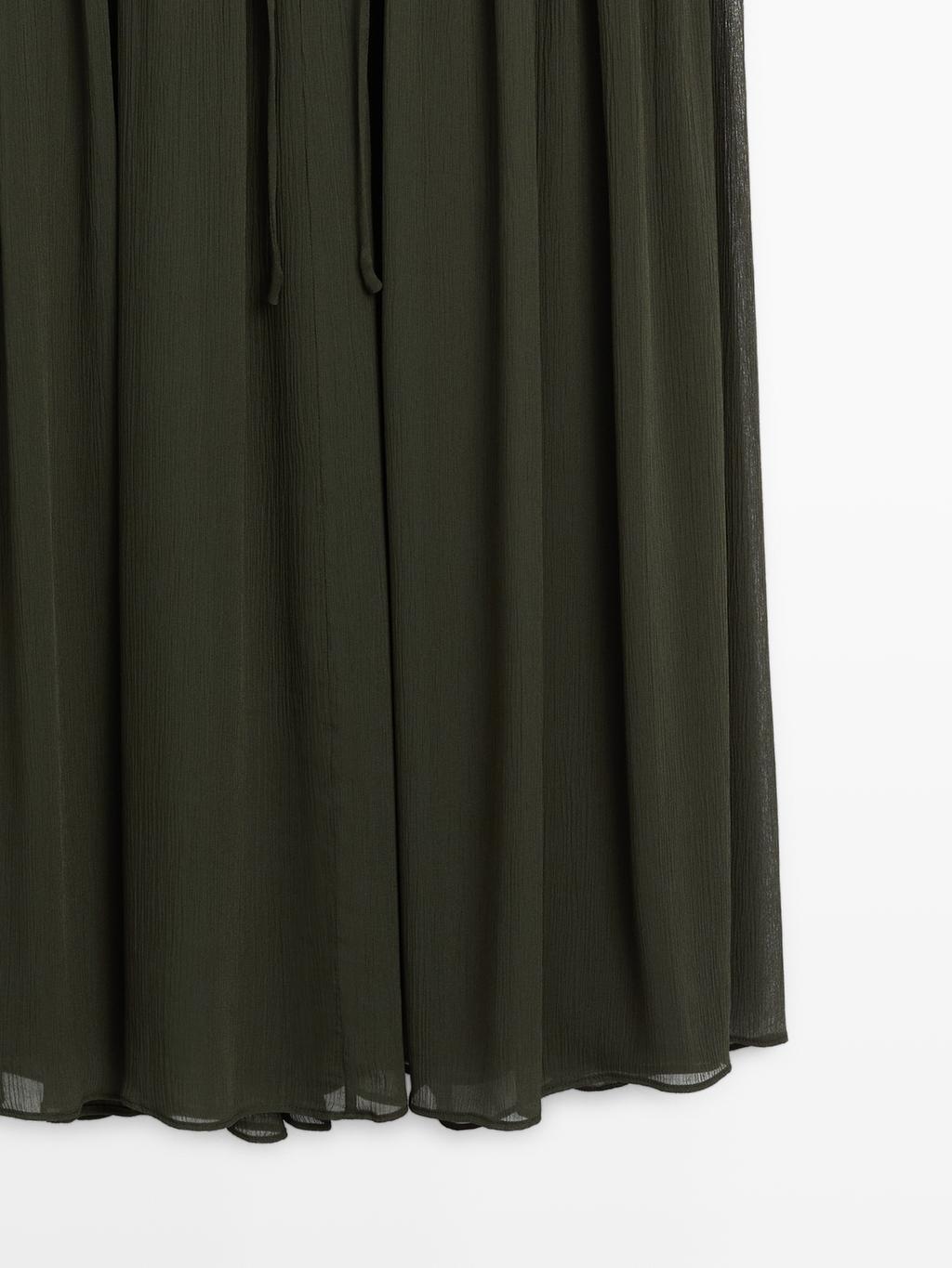 Long flowing dress with ruffle detail