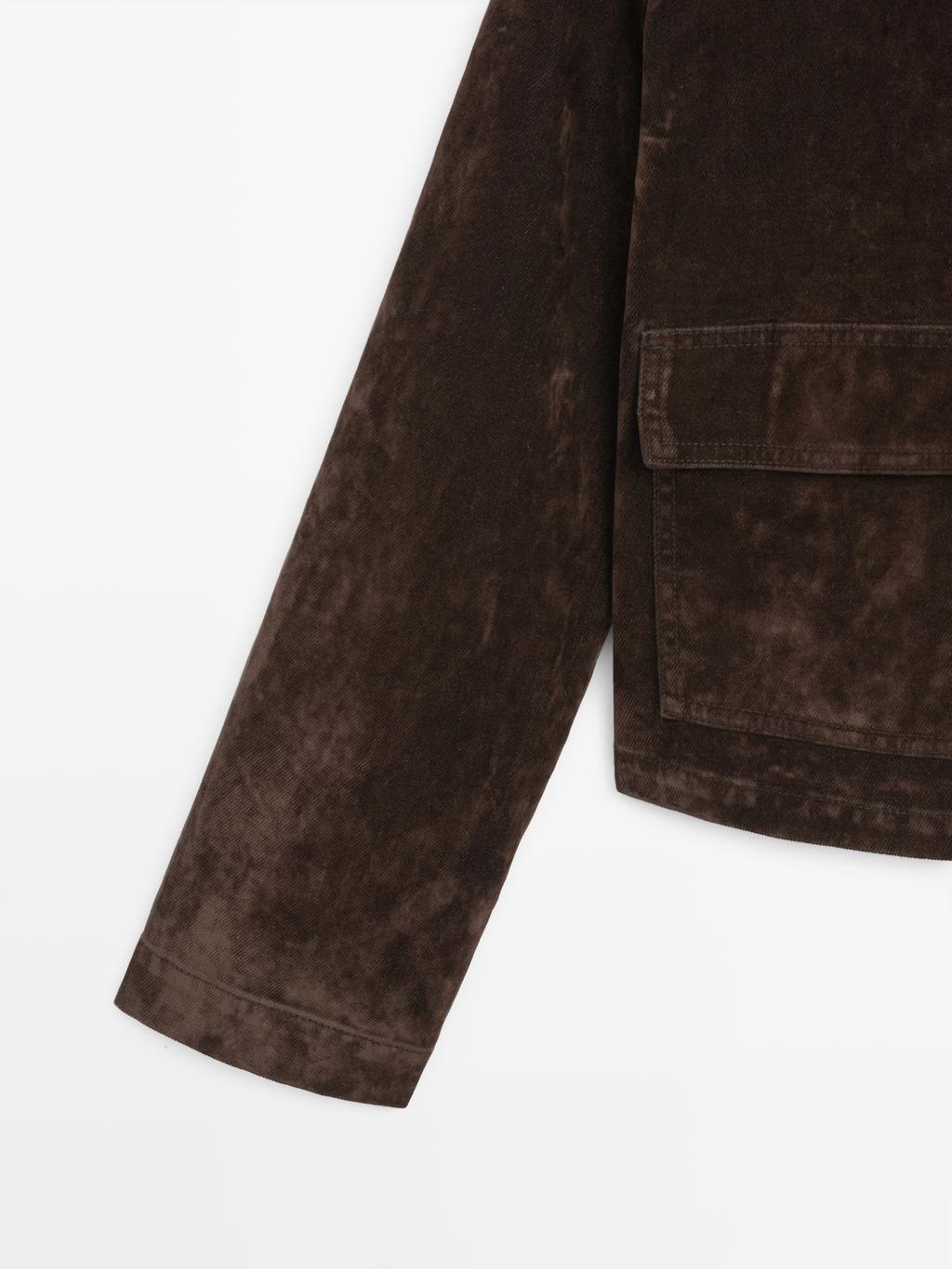 Short denim jacket with pockets and flocked finish