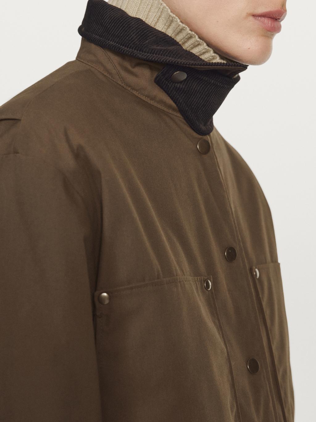 Waxed parka with corduroy detail