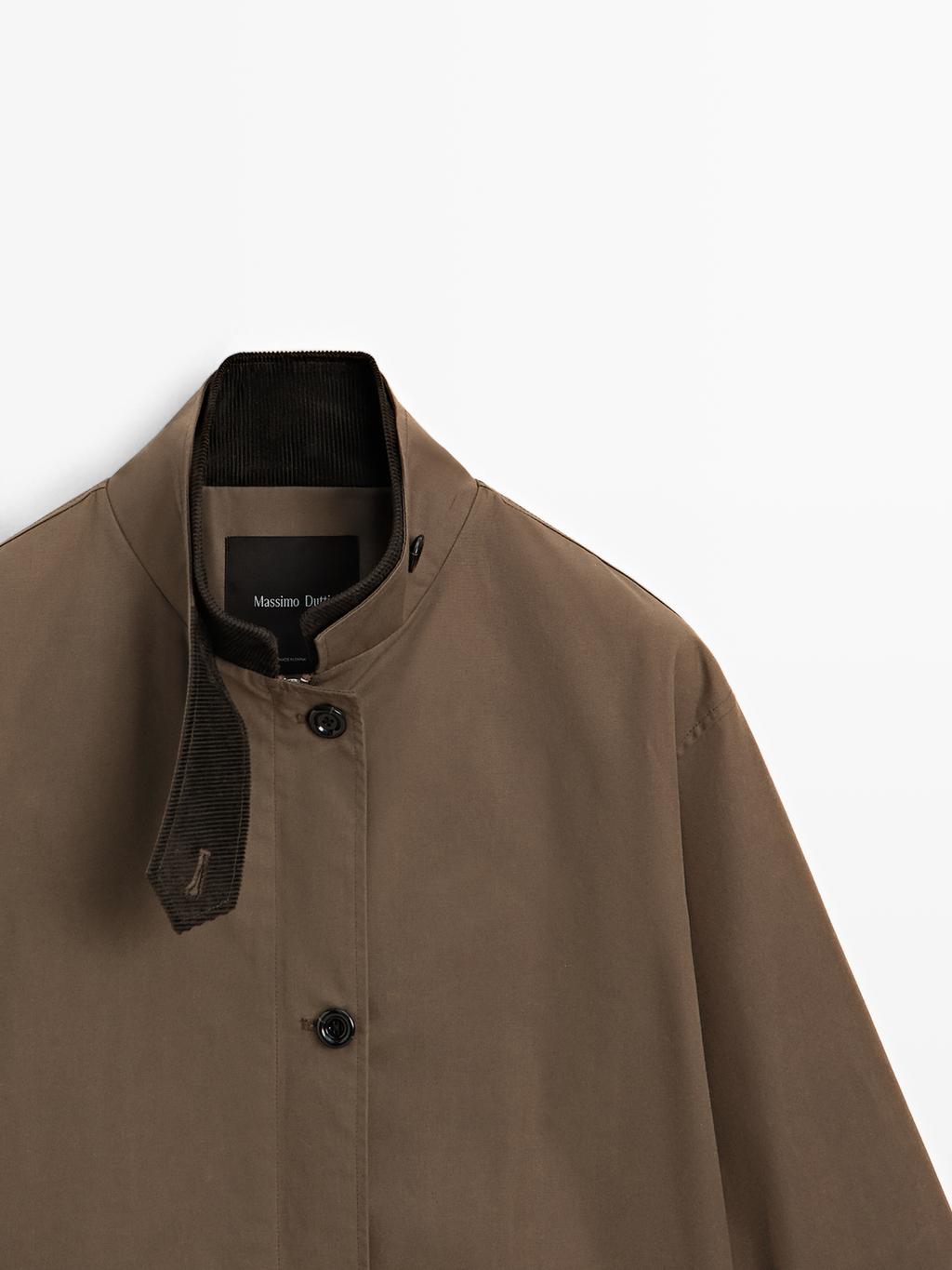 Waxed high neck parka with corduroy detail