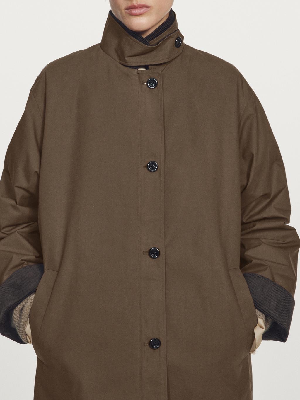 Waxed high neck parka with corduroy detail