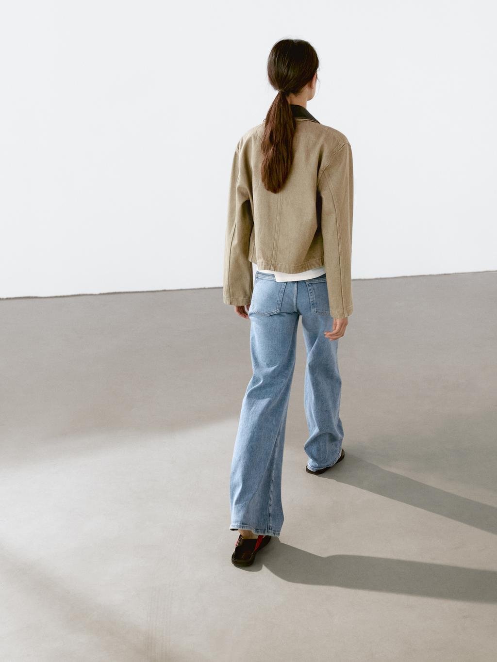 Jacket with detachable leather collar detail